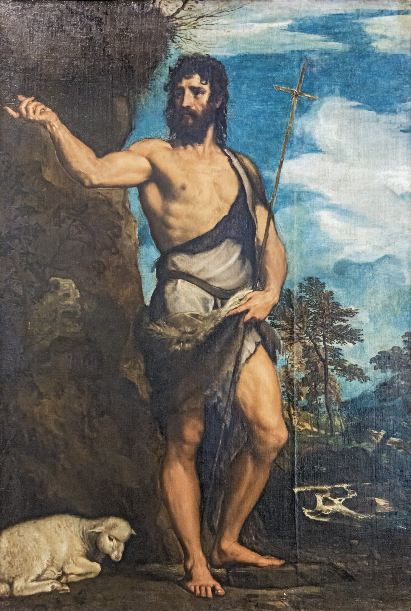 João Batista com cordeiro e cajado em forma de cruz, em pintura de Ticiano, entre 1540 e 1542.